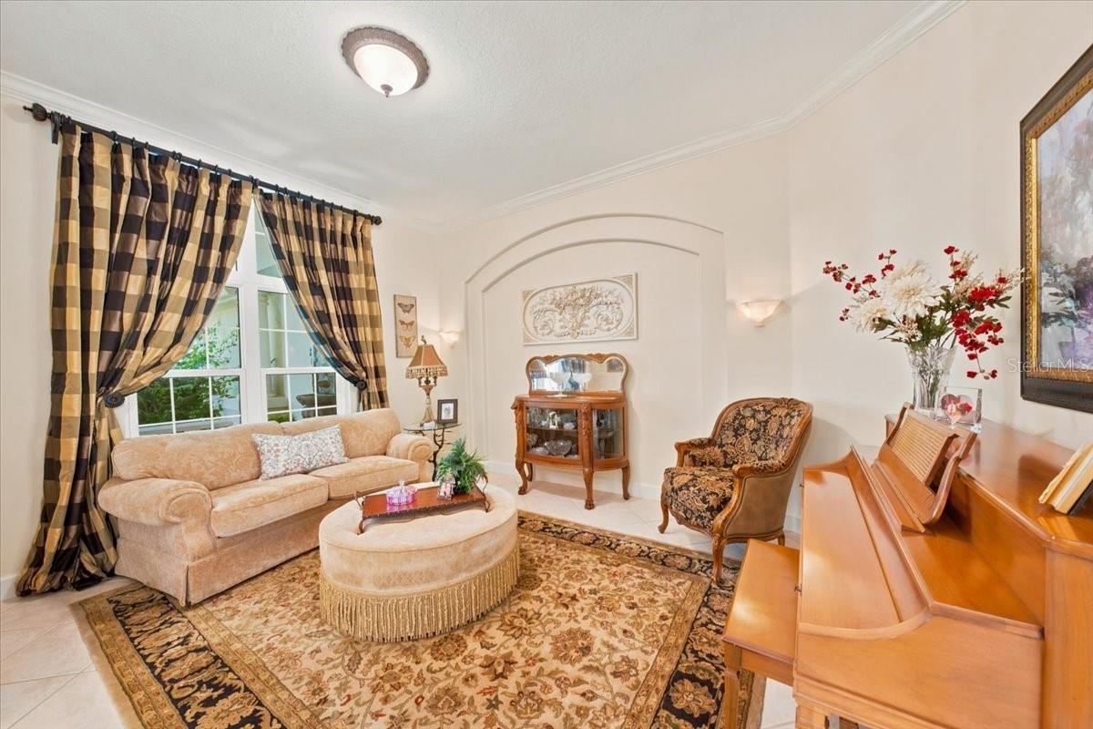 Dedicated formal living space offers an elegant setting for conversation and relaxation.