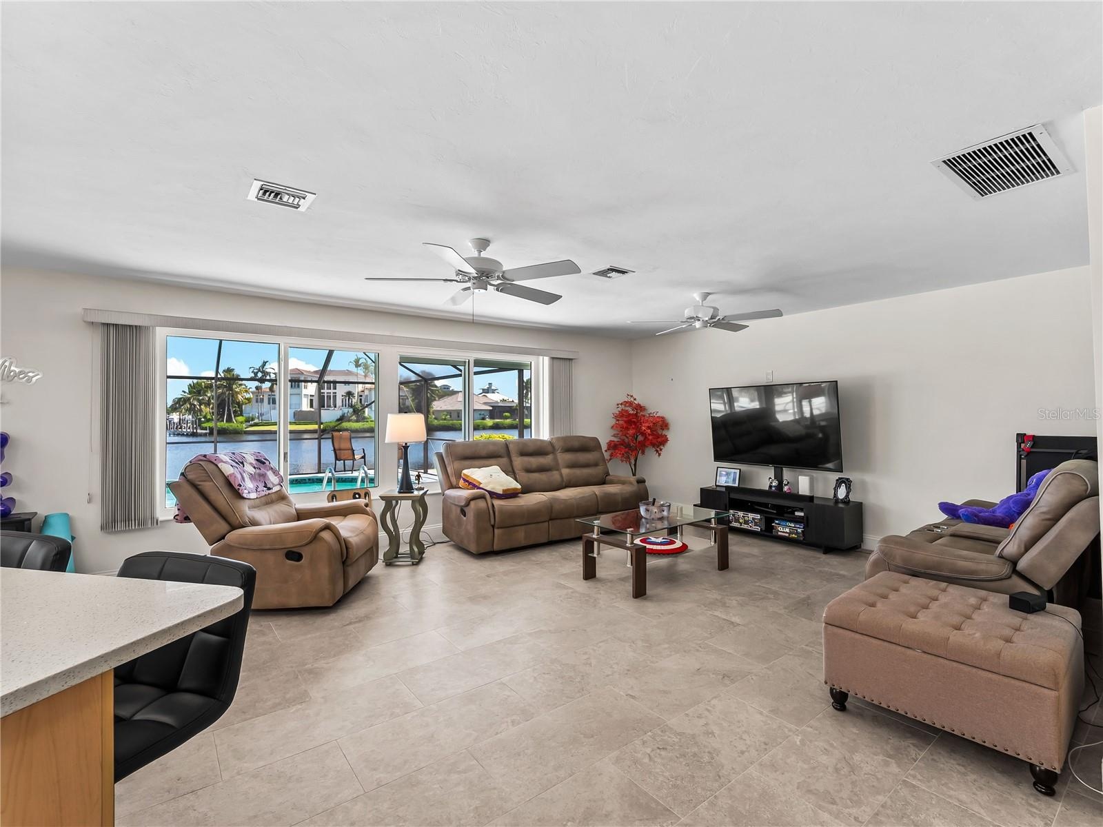 DiningLiving_2903rdStreet_BonitaSprings_OpenConcept_WindowView.jpg