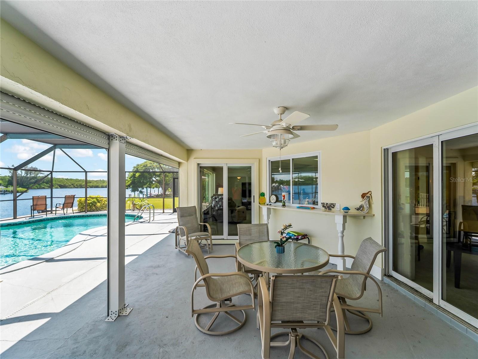 CoveredPatio_2903rdStreet_BonitaSprings_PoolView_SliderView.jpg