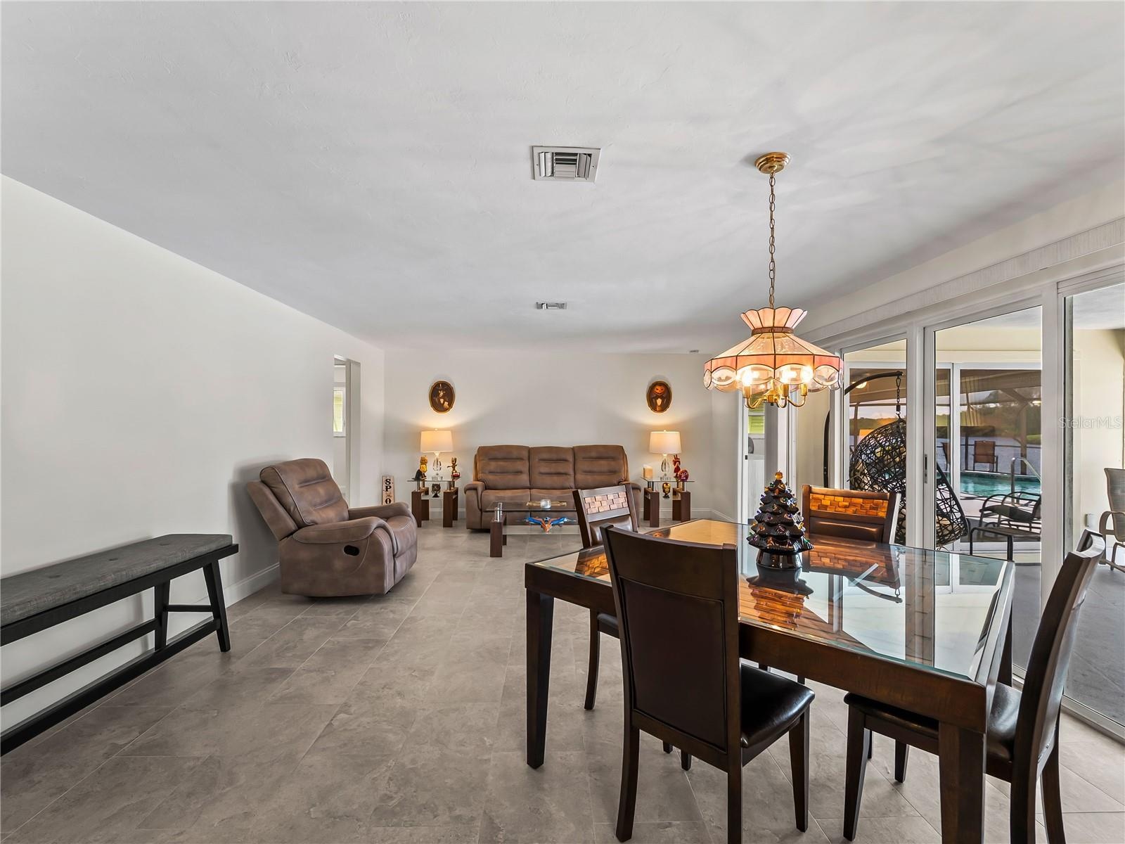 DiningLiving_2903rdStreet_BonitaSprings_OpenConcept_Corner.jpg