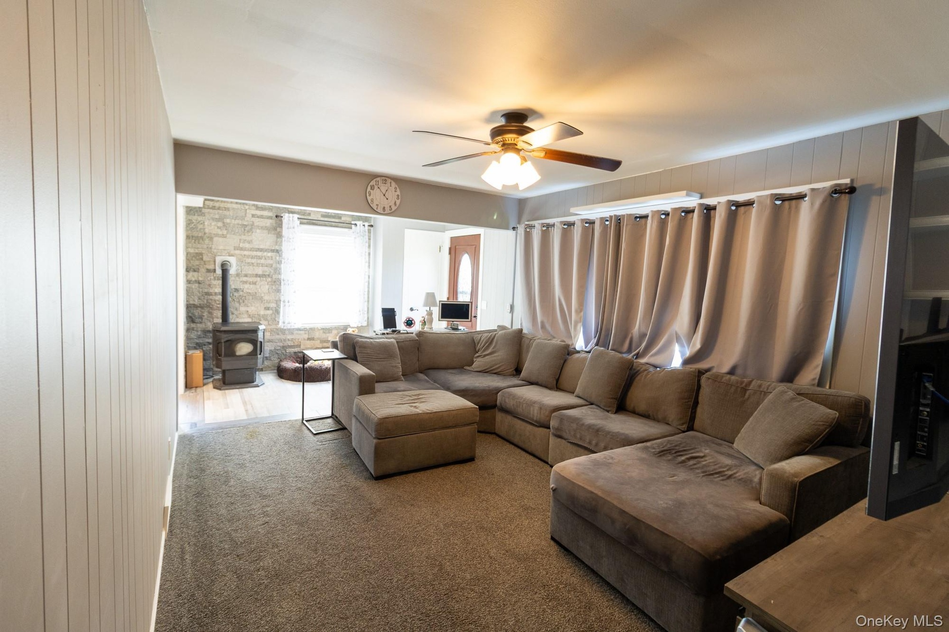 Comfortable gathering area with natural light and room for everyday living.