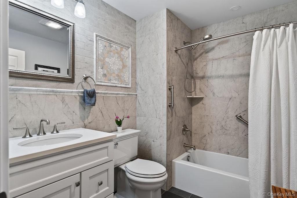 This beautifully updated bathroom is in bedroom #2