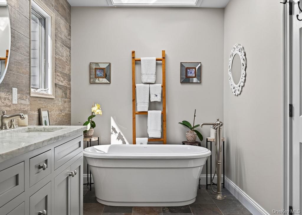 Primary, en-suite bathroom, complete with soaking tub