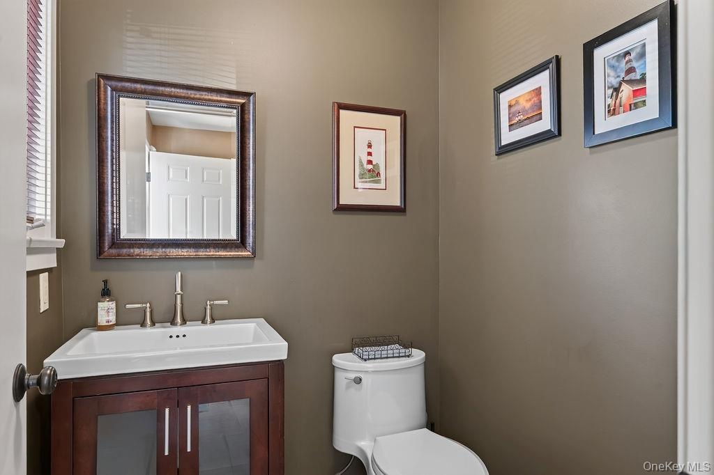 Powder room in entry foyer
