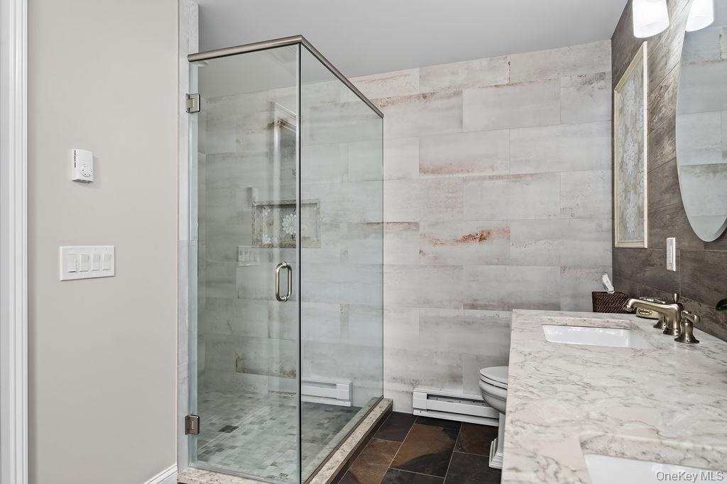 Oversized walk is shower and double vanity