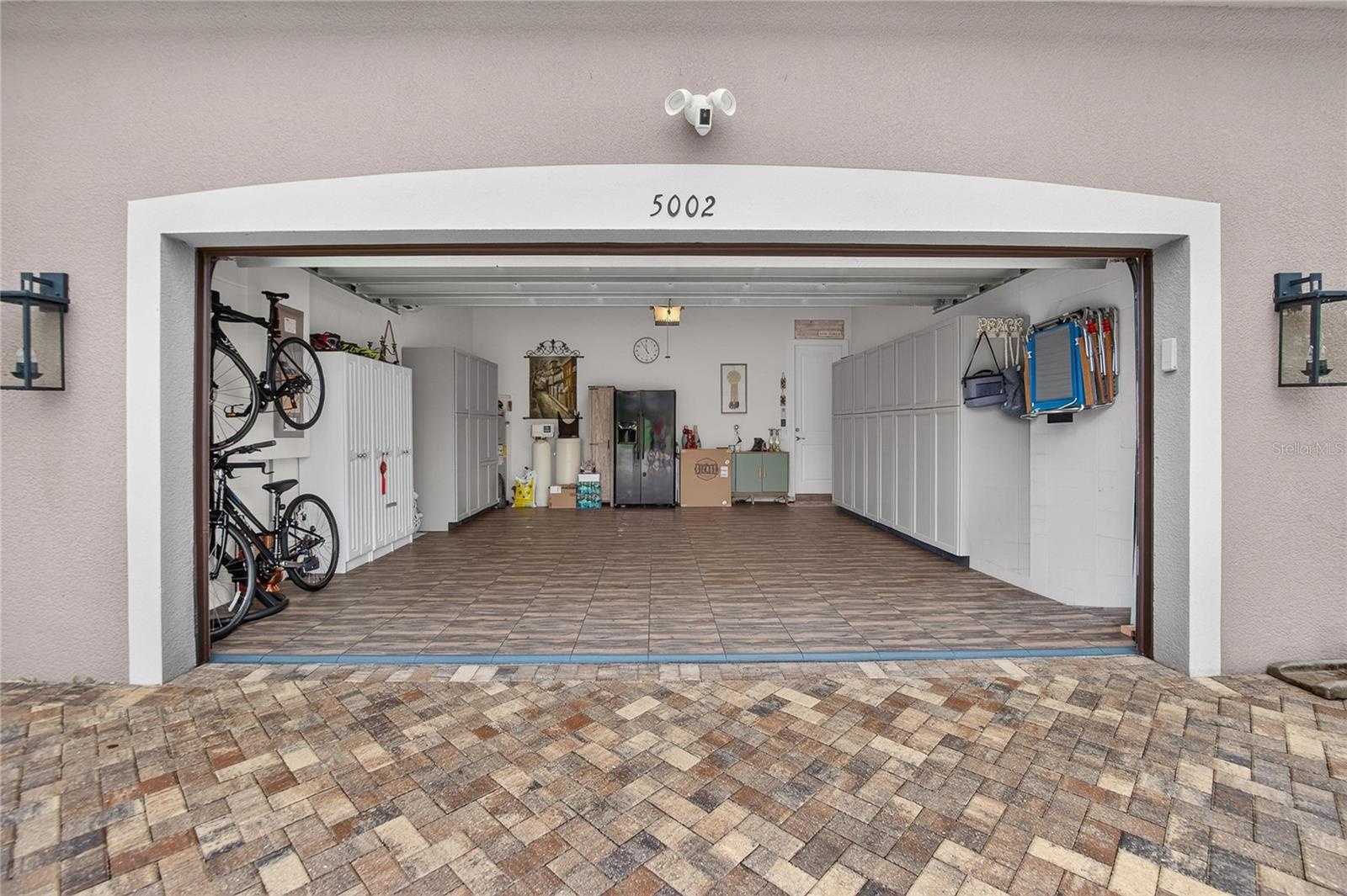 Air Conditioned Two-Car Garage with LVP Garage Flooring & Insulated Garage Door