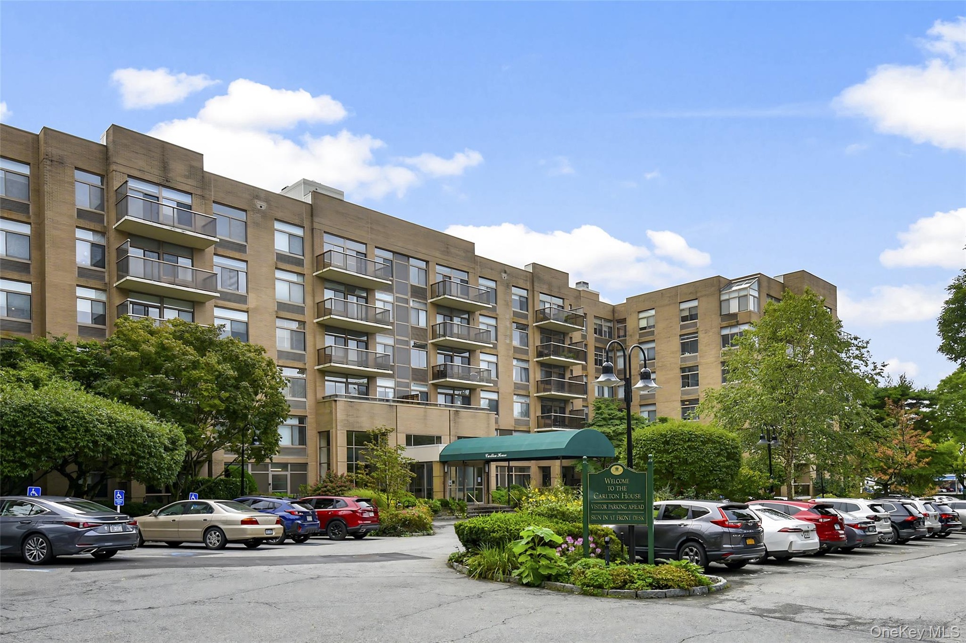 Oversized Parking for Residents and Guests and a Parking Garage in Rear as well as Handicaped parking