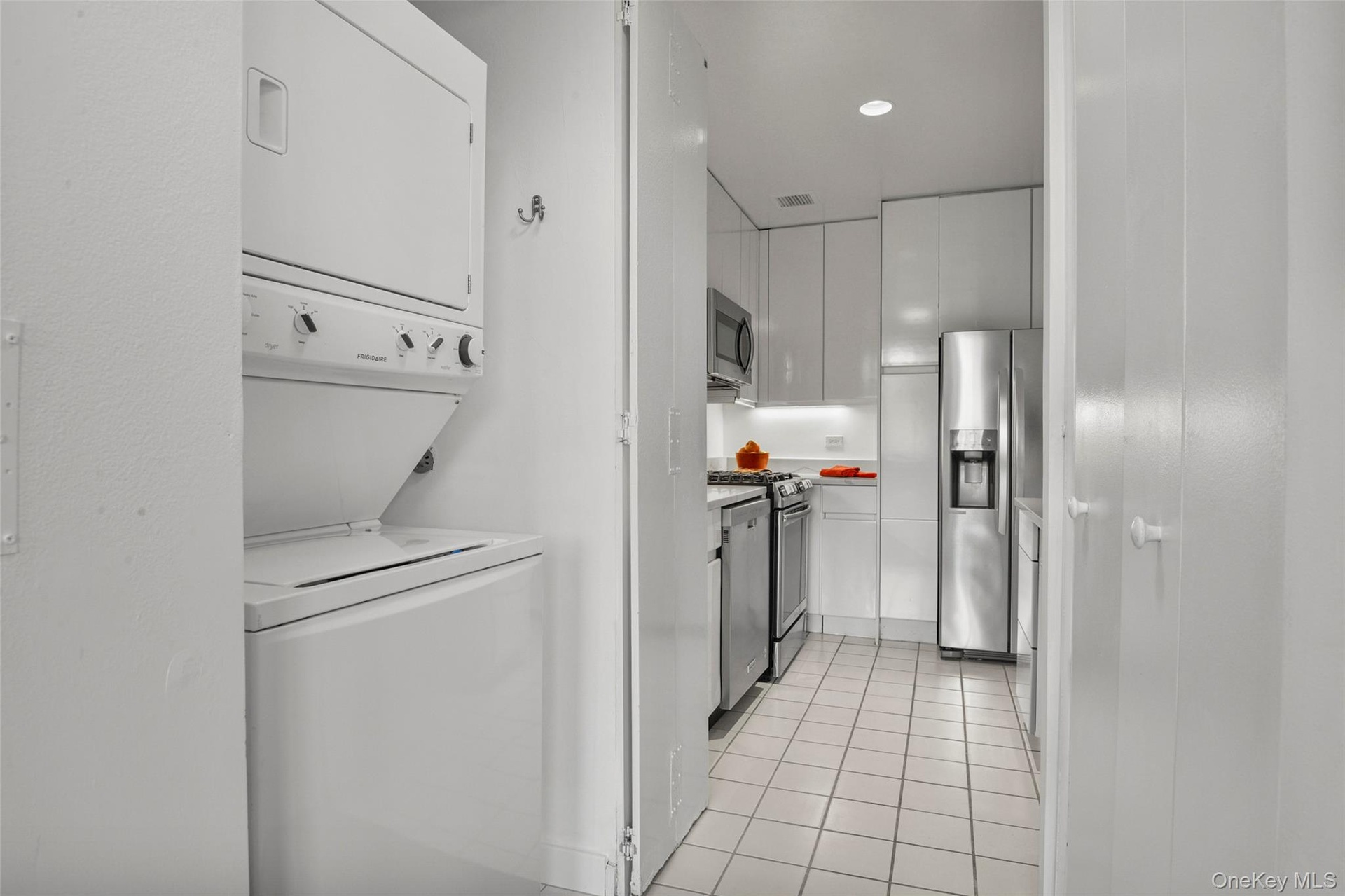 Washer and Dryer and a large Pantry Closet
