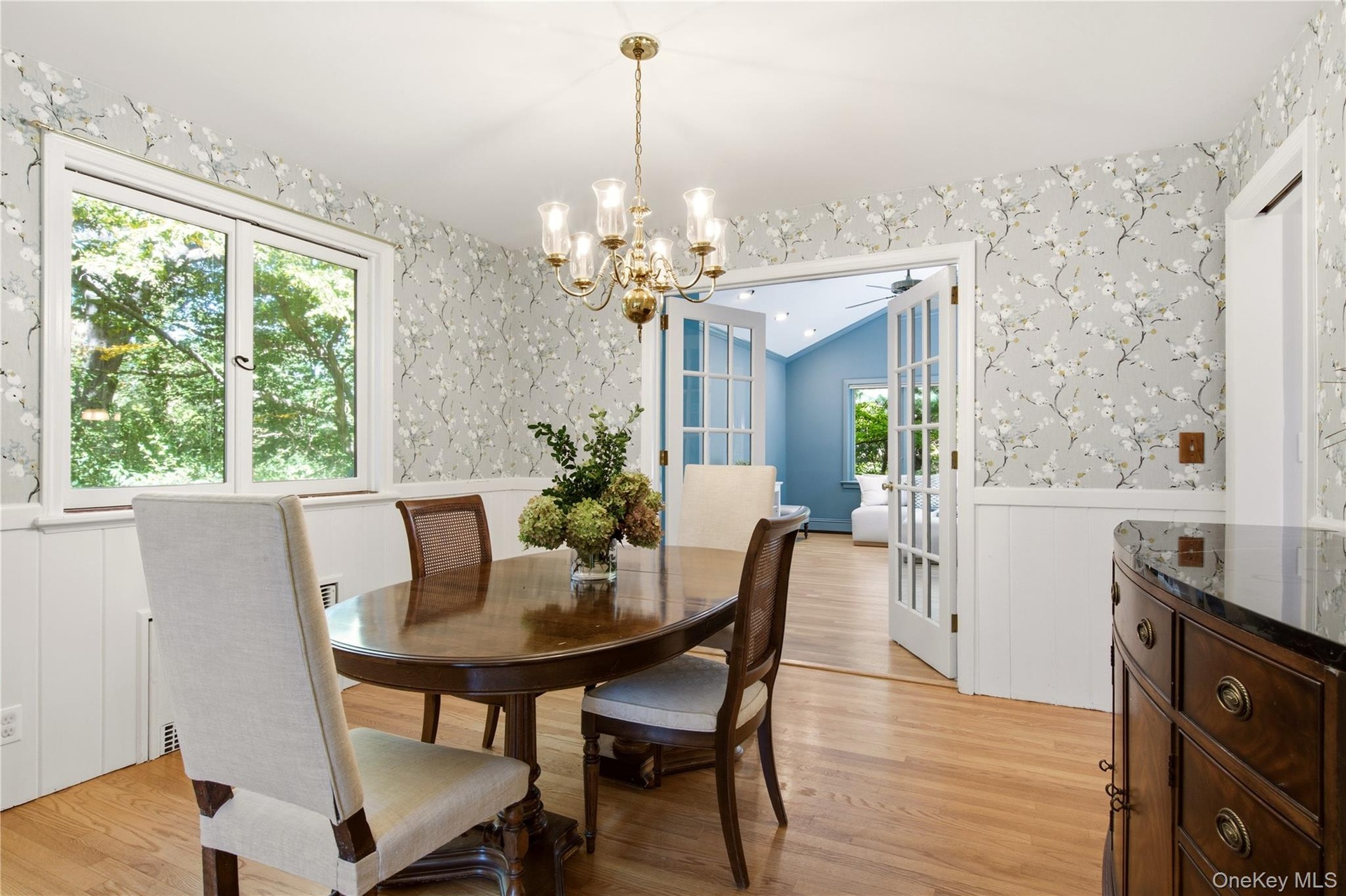 Formal dining area open to living room for extended entertaining