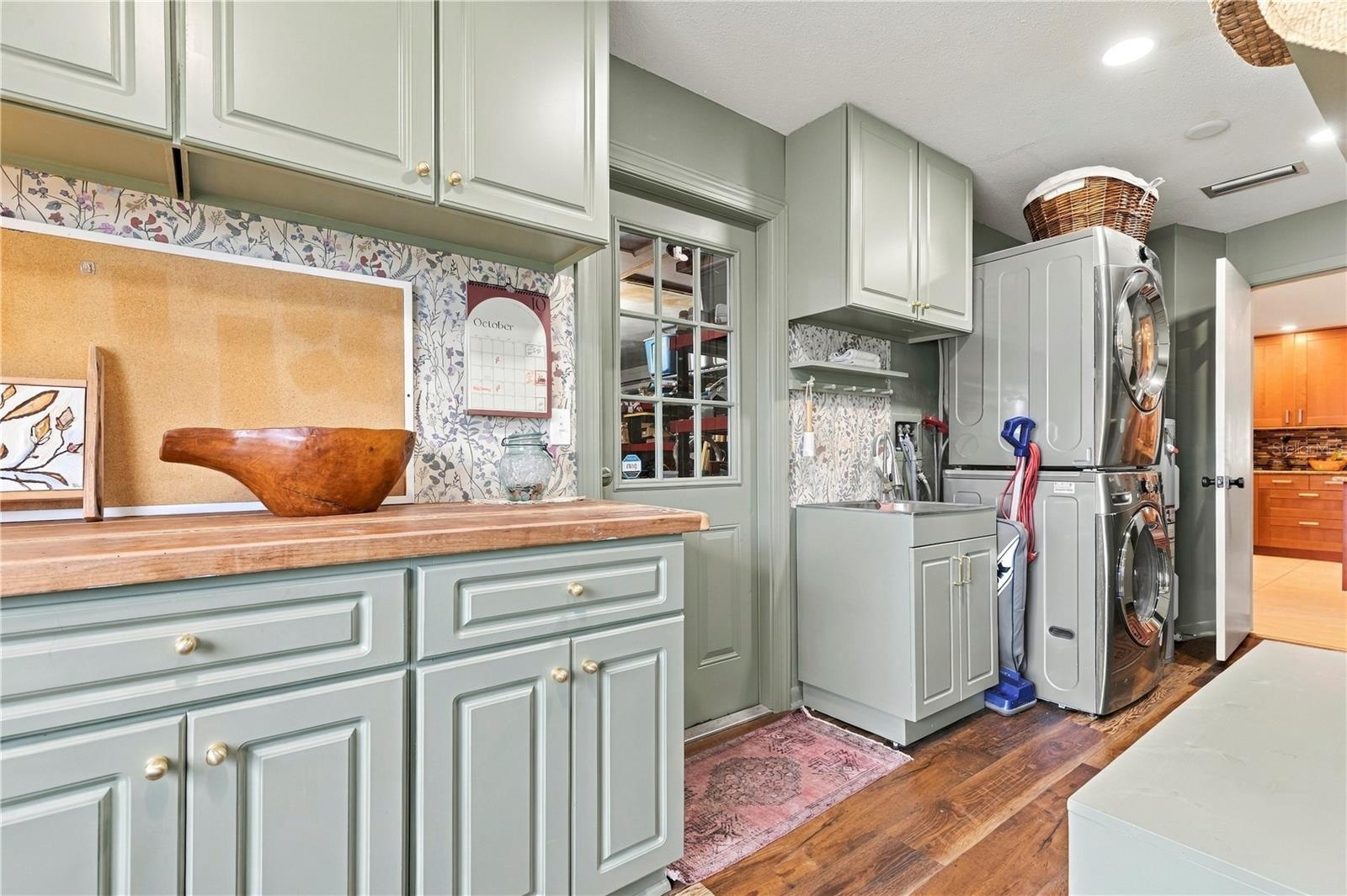 Laundry room with sink access to garage