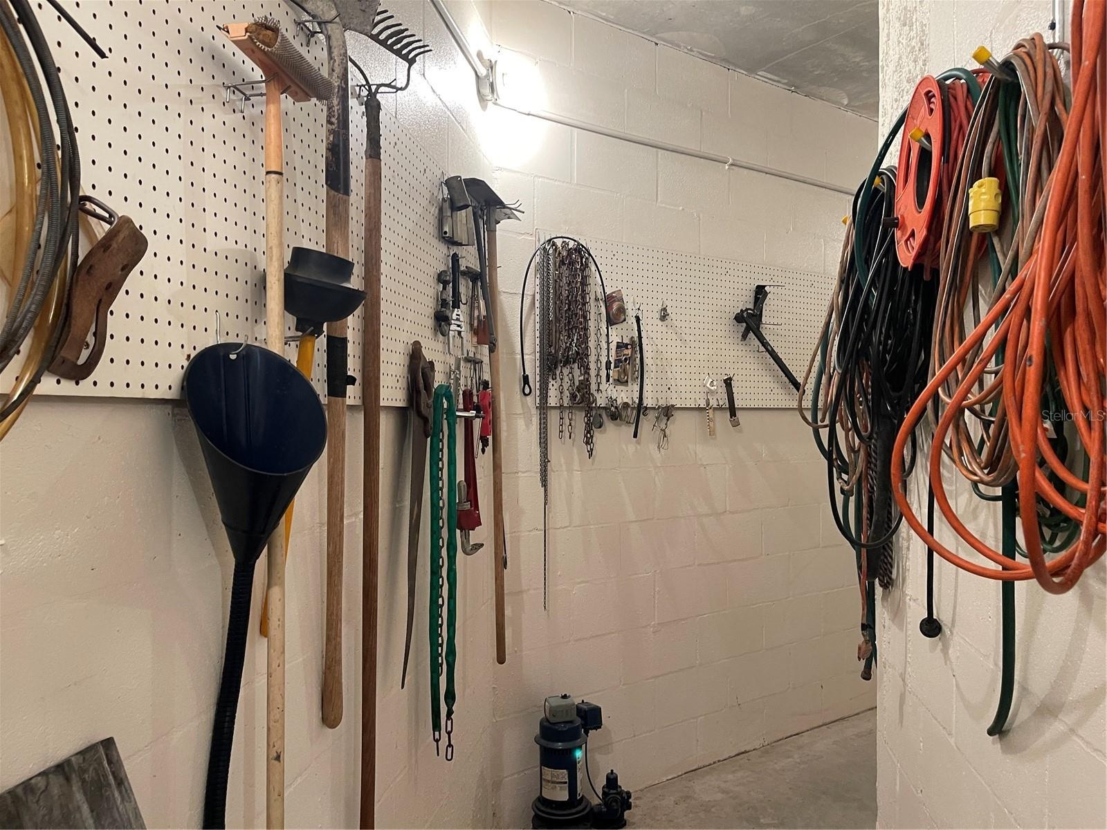 Plenty of hooks and peg board for hanging tools and equipment