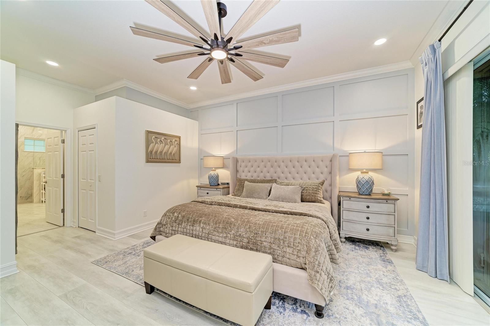 Primary Bedroom with feature wall.