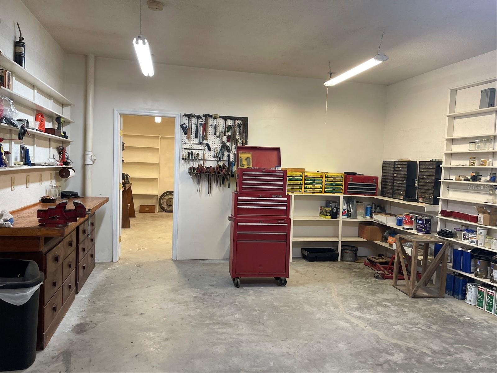 Workshop off to the right in garage through the door