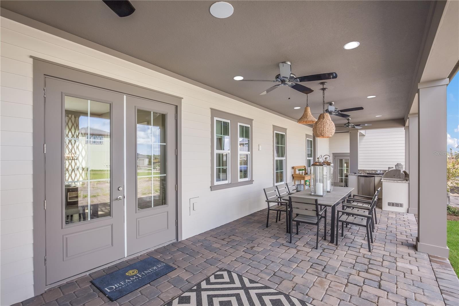 The sample photos included are of the model home and are meant to showcase the craftsmanship and design quality.