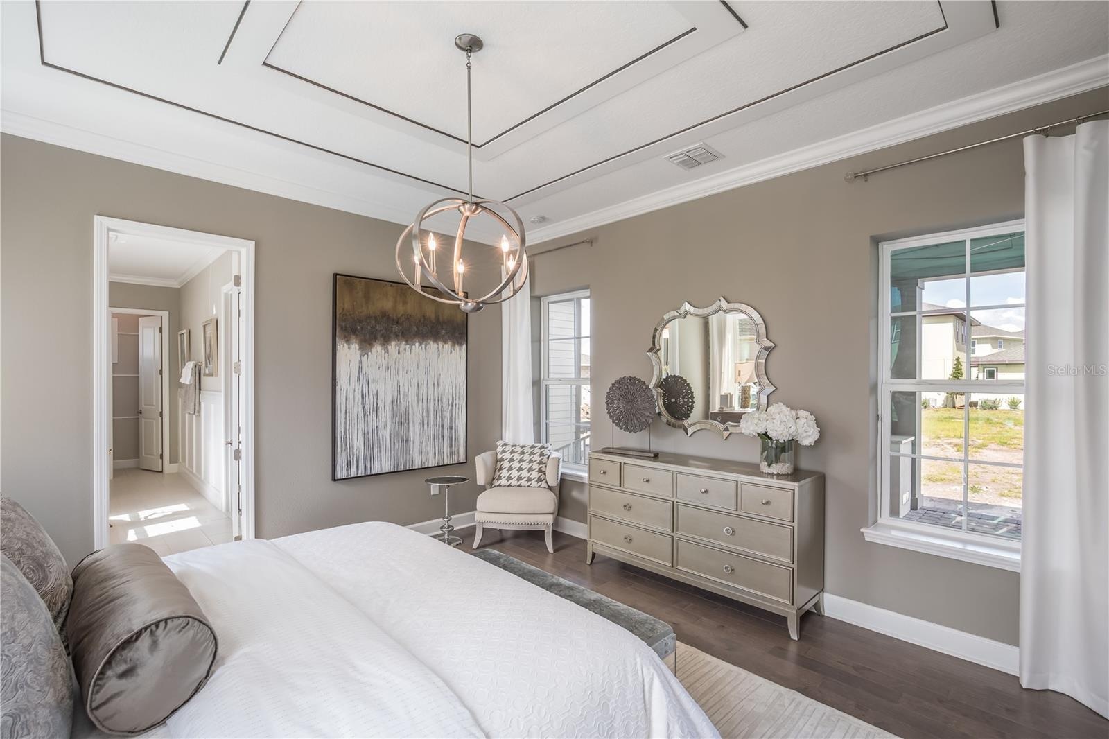 The sample photos included are of the model home and are meant to showcase the craftsmanship and design quality.