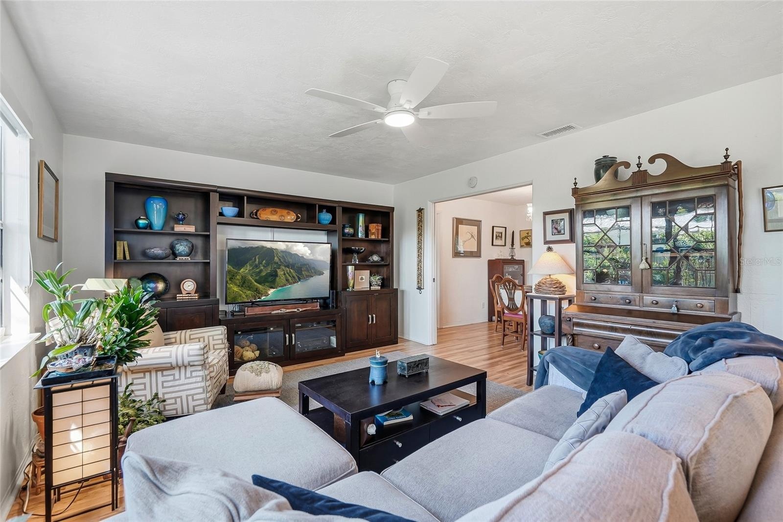 Picture movie nights or a quiet evening at home in this inviting family room, with generous space for comfortable seating and your entertainment setup
