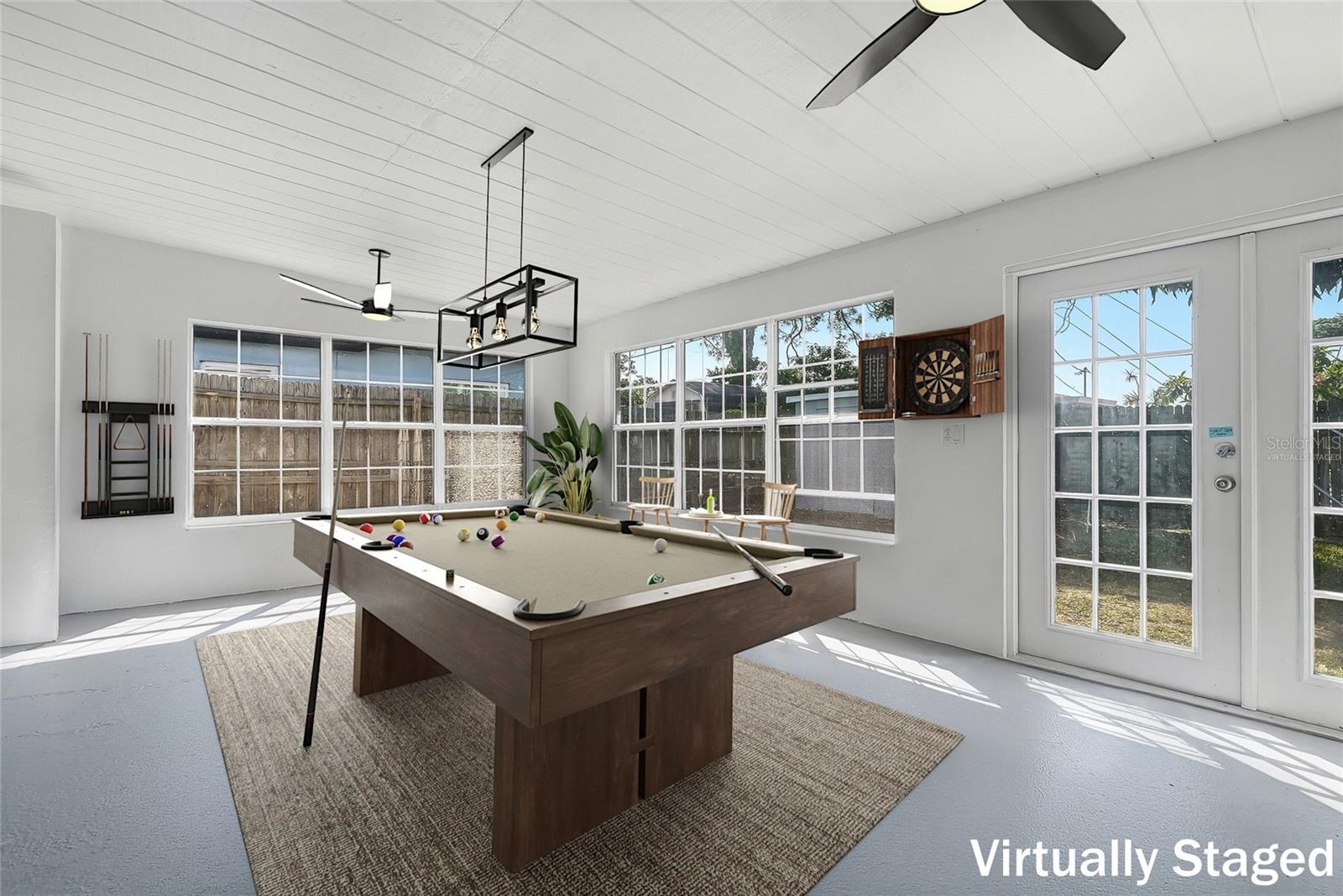 Virtually Staged. The Florida room has great potential to tailor to your personal preferences.