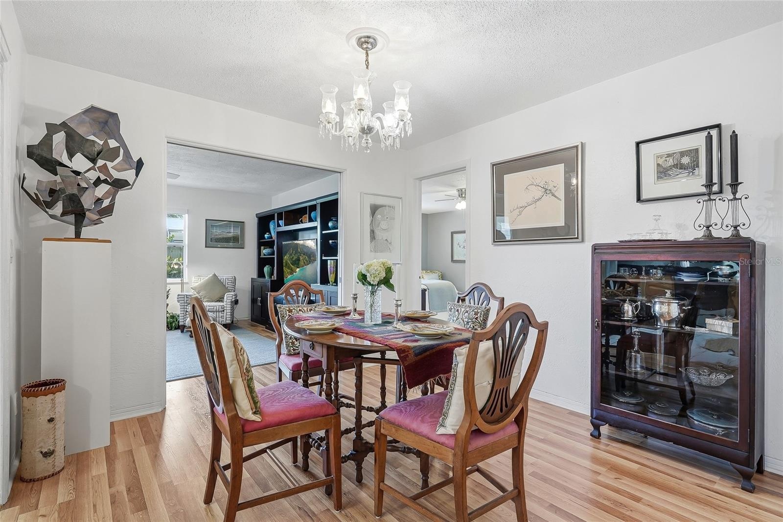 From everyday meals to special occasions, the dedicated dining area offers an inviting place to gather beside the family room.