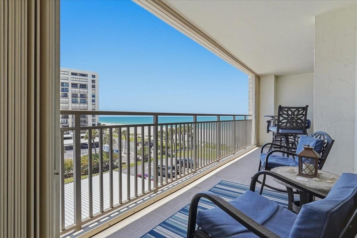 PRIVATE, COVERED BALCONY WITH ACCESS FROM EVERY ROOM!
