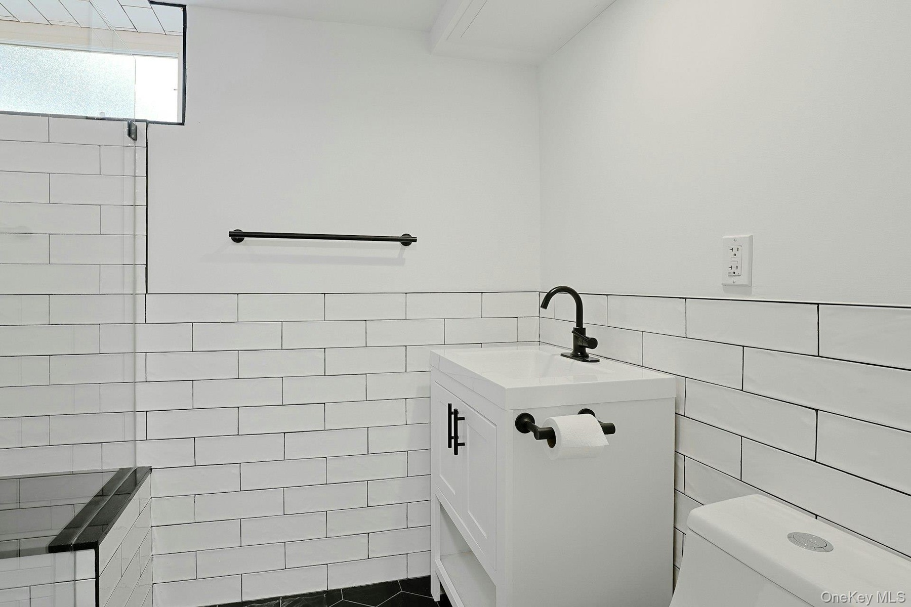 bathroom with walk-in shower