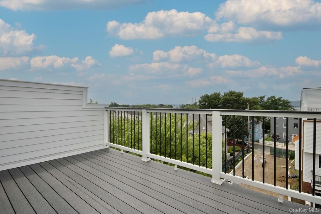 Roof top deck with scenic river views. Perfect for entertaining and watching the sunsets.