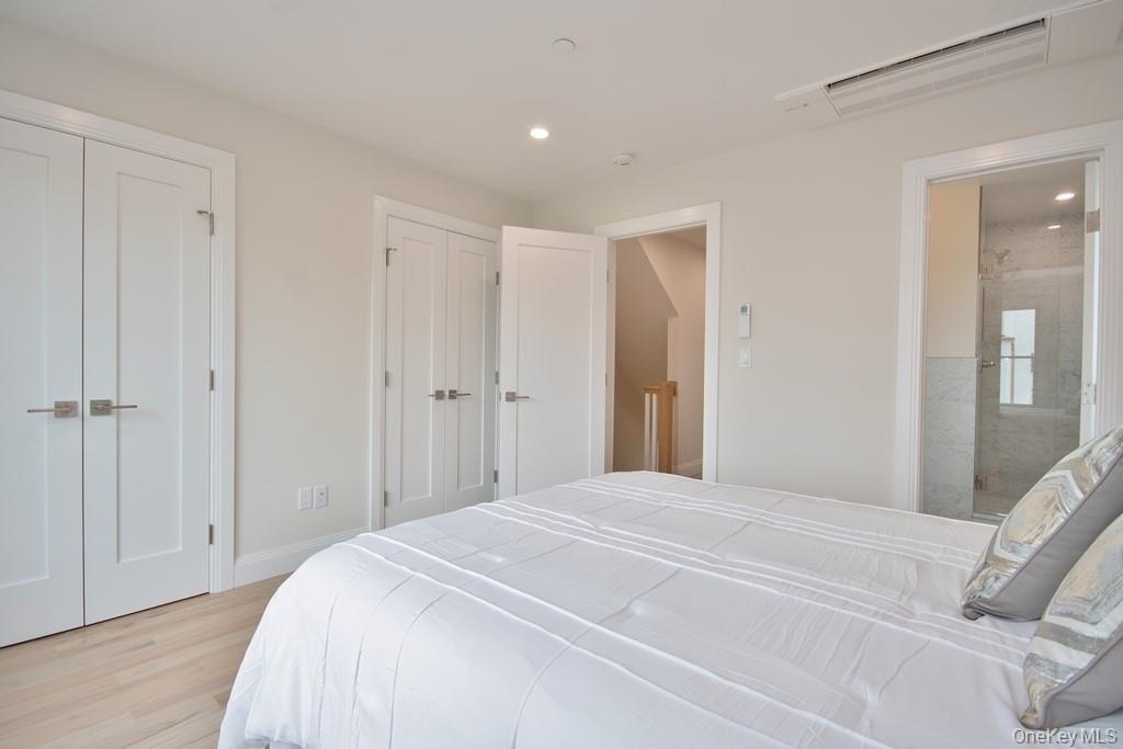 Master bedroom featuring en-suite bath and double closets.
