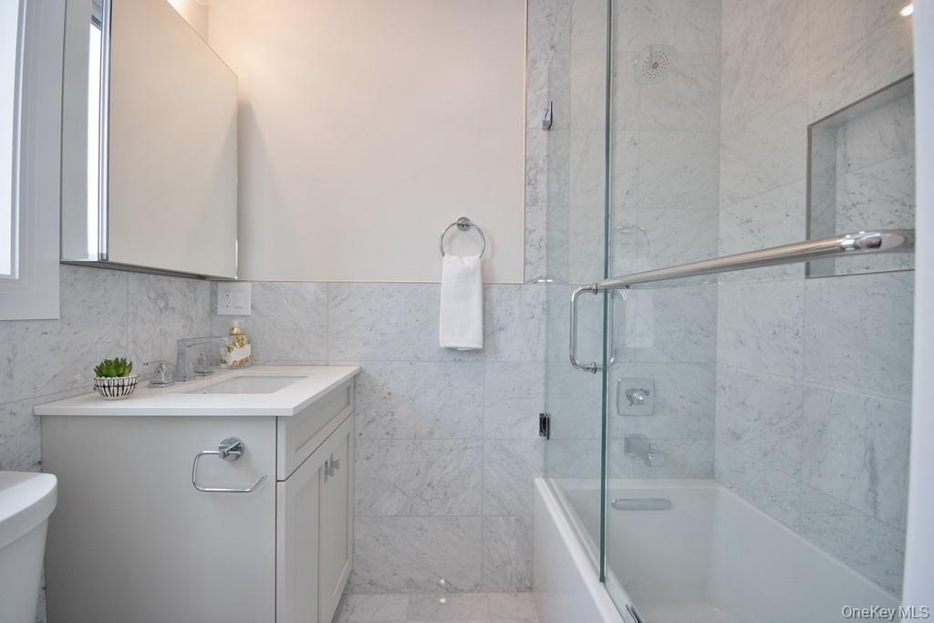 Full bath in second bedroom.