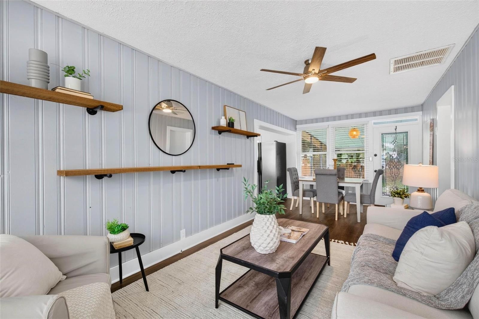 Ceiling fans throughout add comfort and style