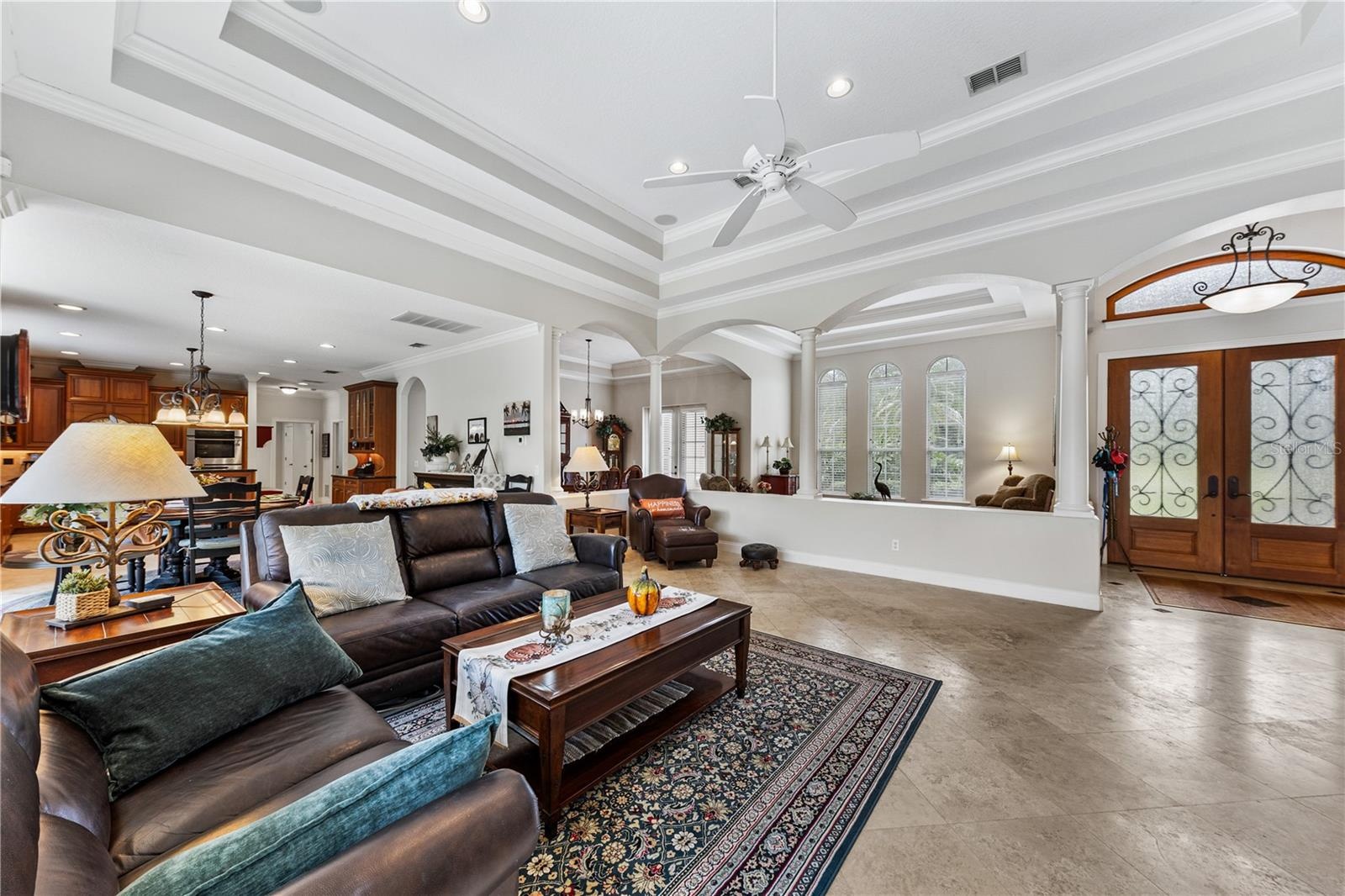 FAMILY ROOM W TRAY CEILING AND ENTRANCE