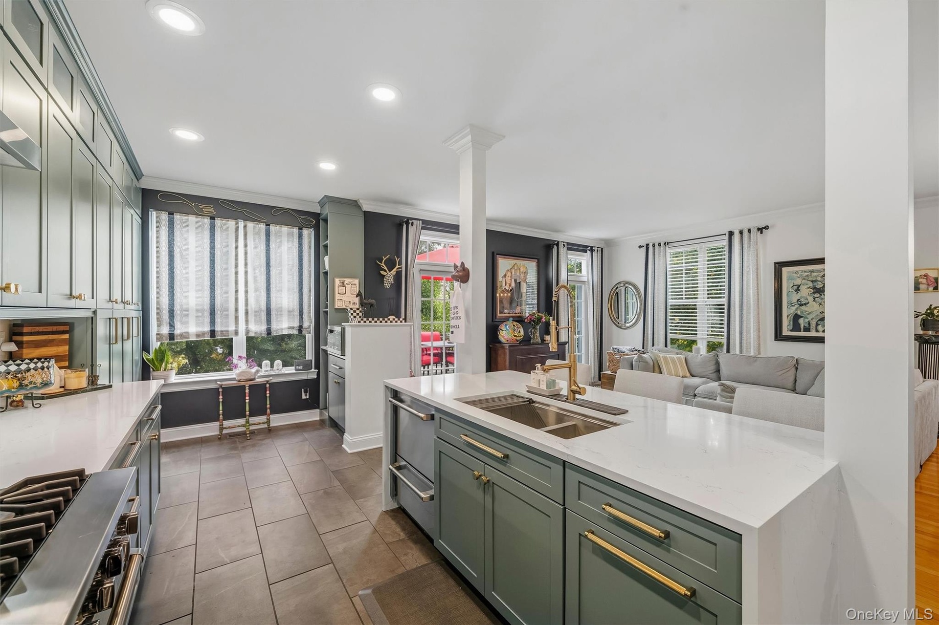 Completely redesigned in 2021. Most units do not have the sink on the island. Notice the two drawer dishwasher.
