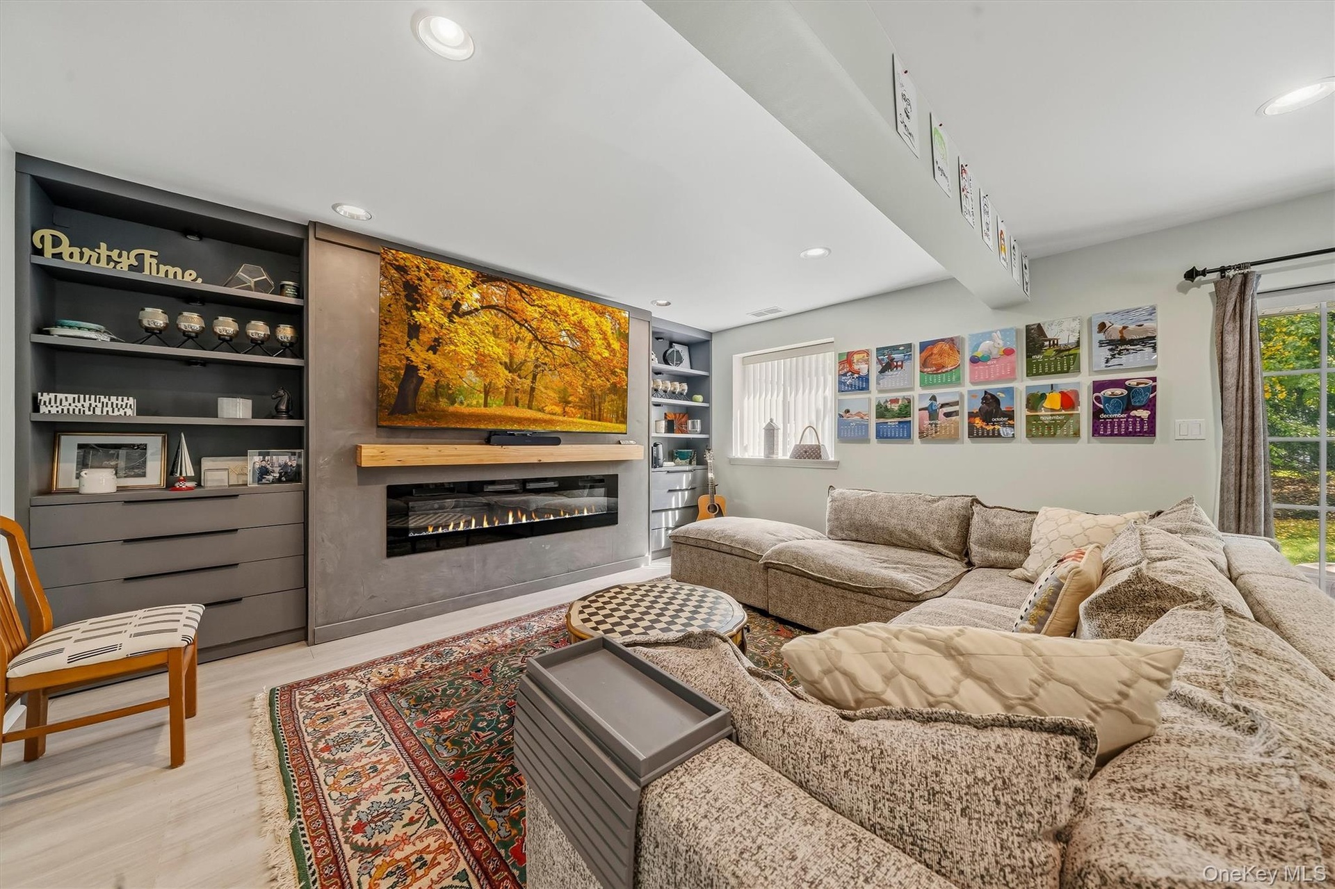 The finished lower level may be the star of this home with it's fireplace, built-ins, walk out and wait till you see the rest.