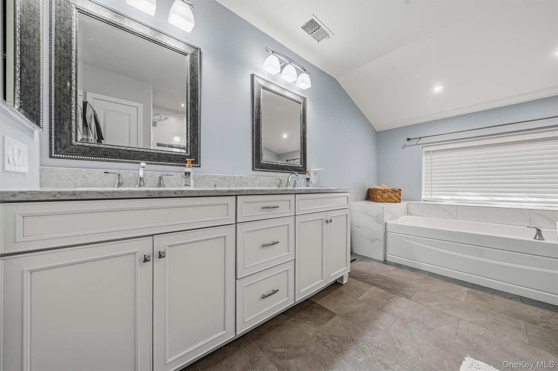 Newly redesigned with double sinks and a huge soaking tub.