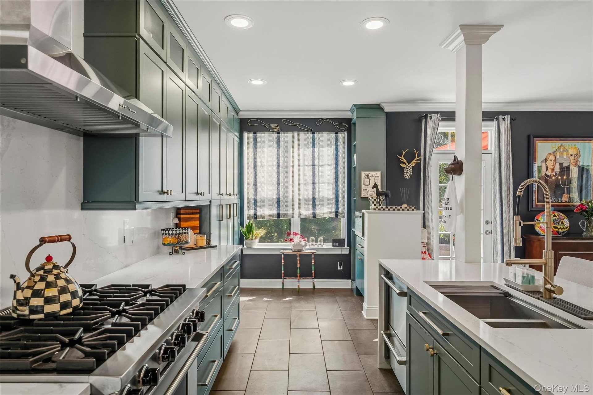 Notice the Viking stove and slate floors.
