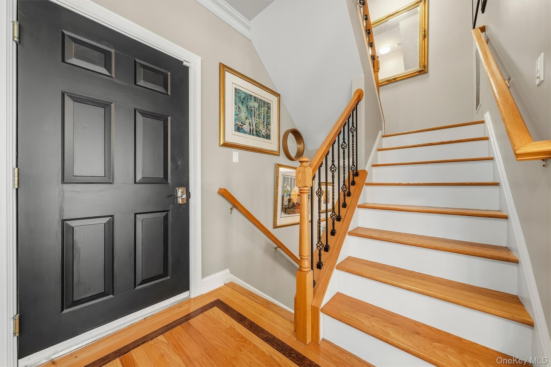This home is all about the details.  New wrought iron spindles are less than 3 years old.
