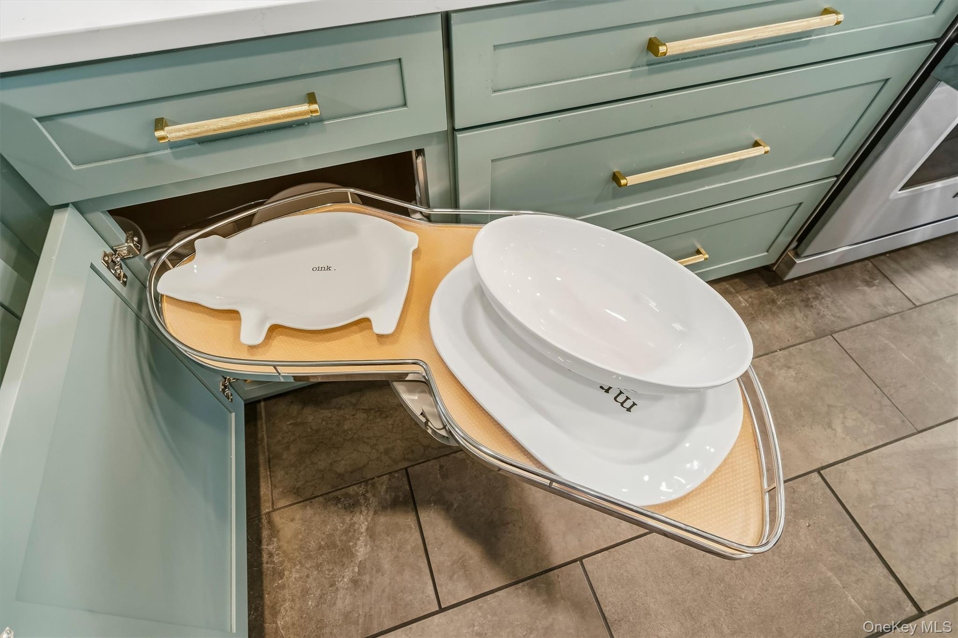 This lazy susan features a spin out pull out. No more getting on your knees to reach the back of the cabinet.
