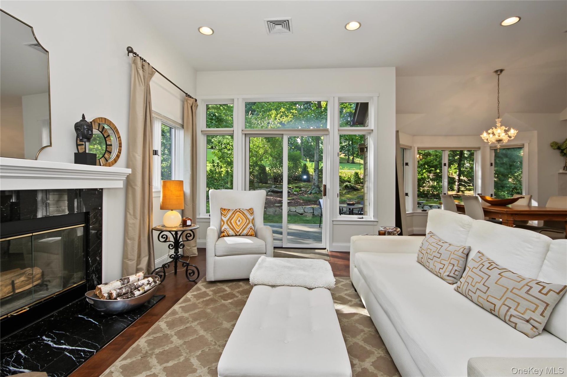 Bright Livingroom with Natural Light and Sliders to Private Patio