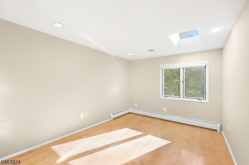 Large 2nd Bedroom w/ Skylight