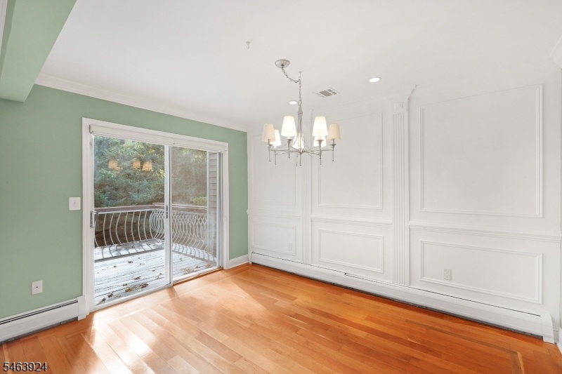 Dining room w/ Sliders to Deck