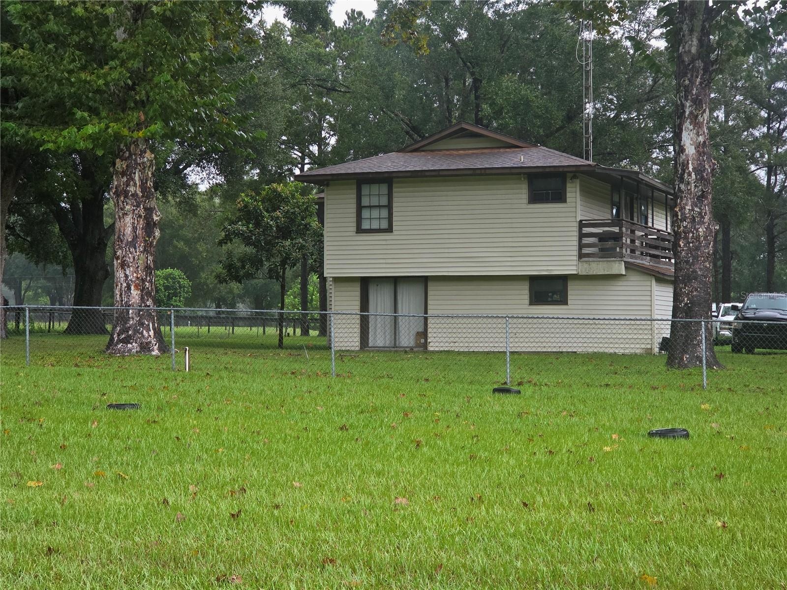 2 story house with deck on North and South sides