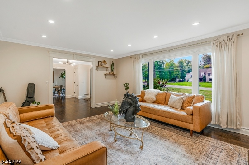 Living room w/foyer in view