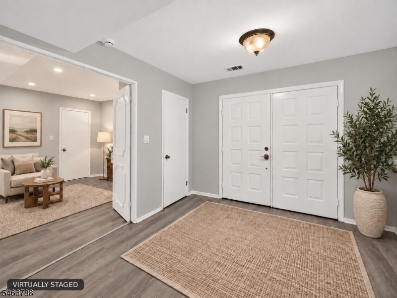 Foyer, with view of Den