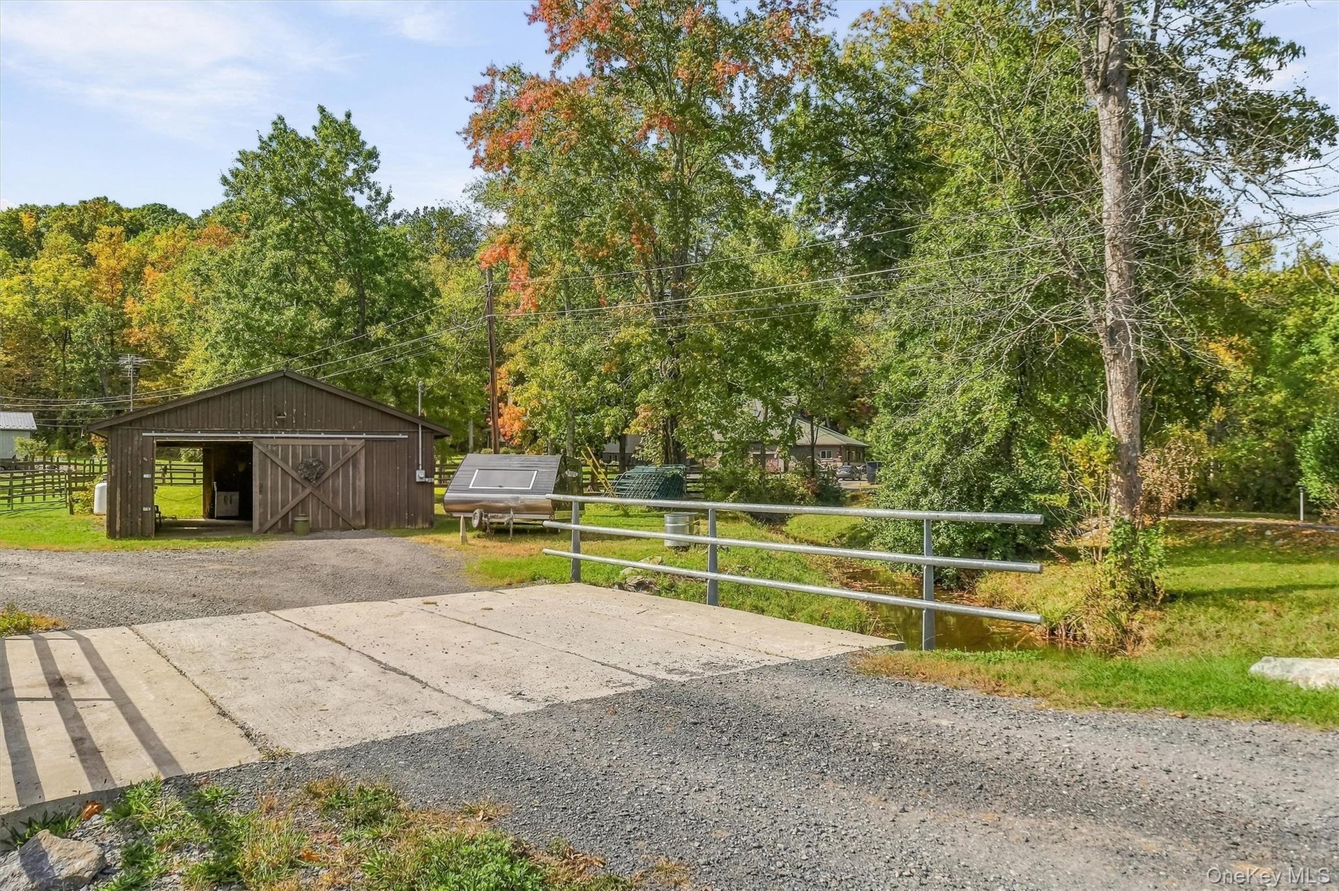The driveway bridge is new (2024).