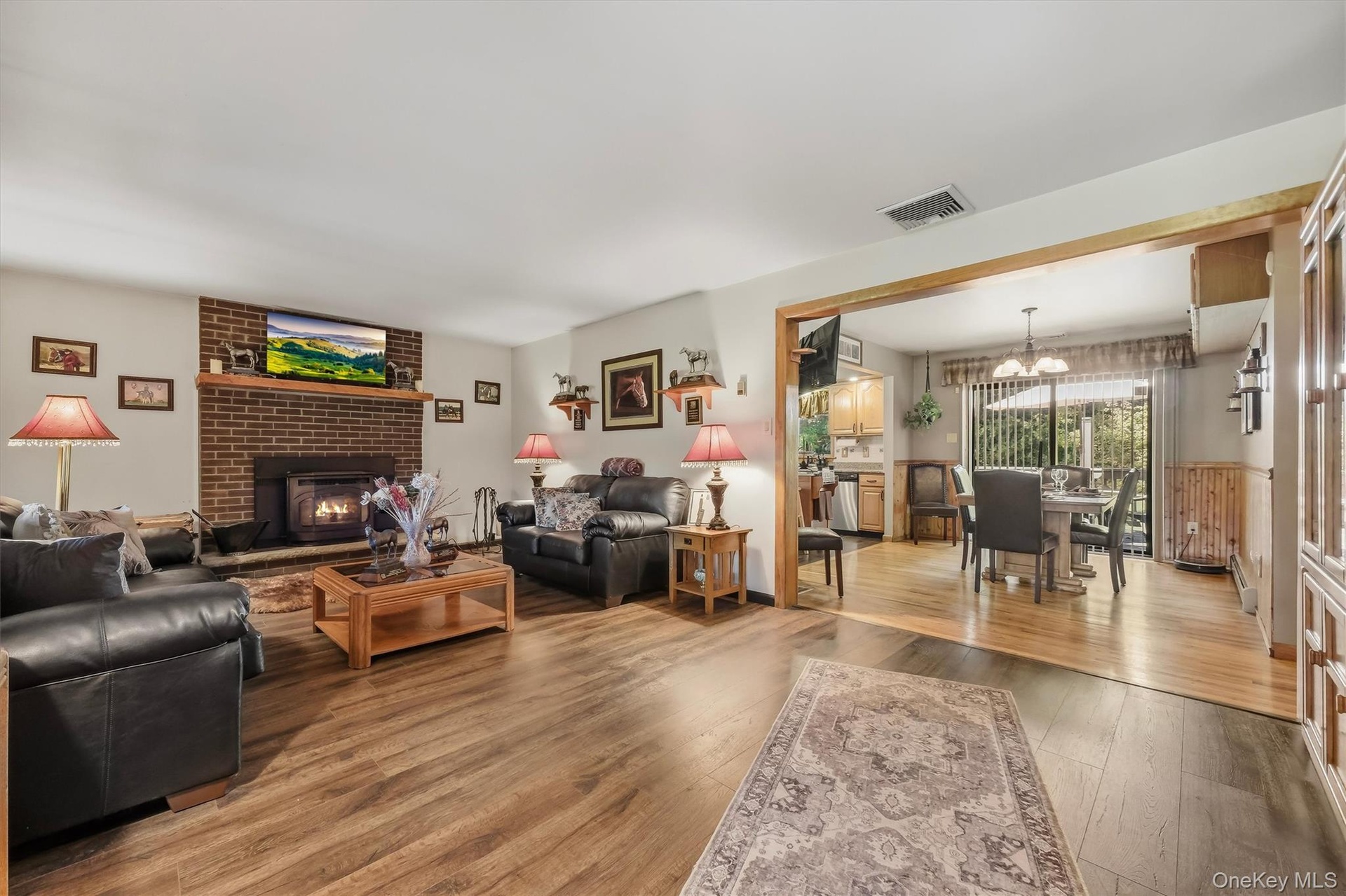 The living room flows nicely into the dining room, allowing plenty of lively conversation.