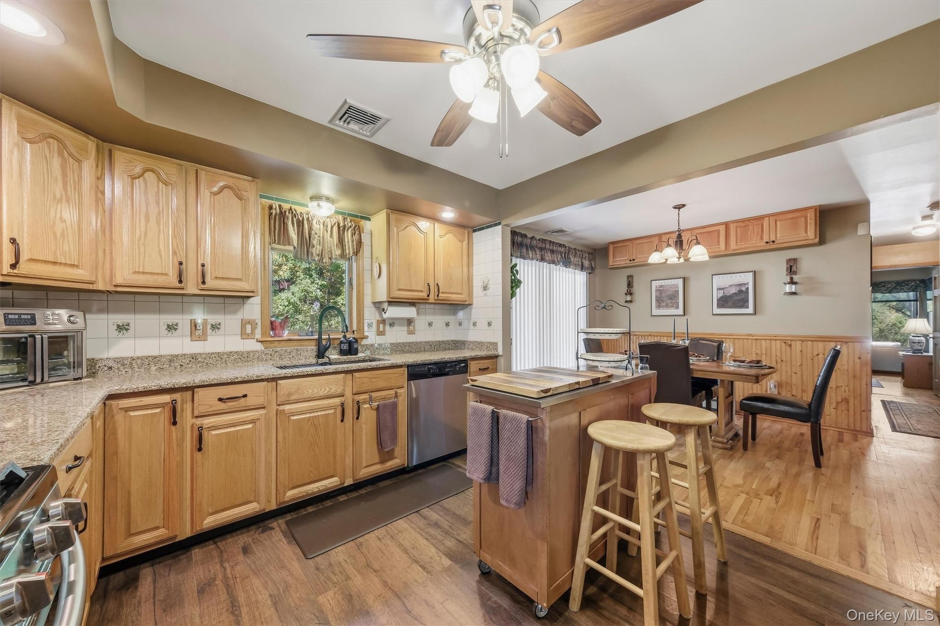 An open floor plan between the kitchen and dining room makes serving a meal a breeze.