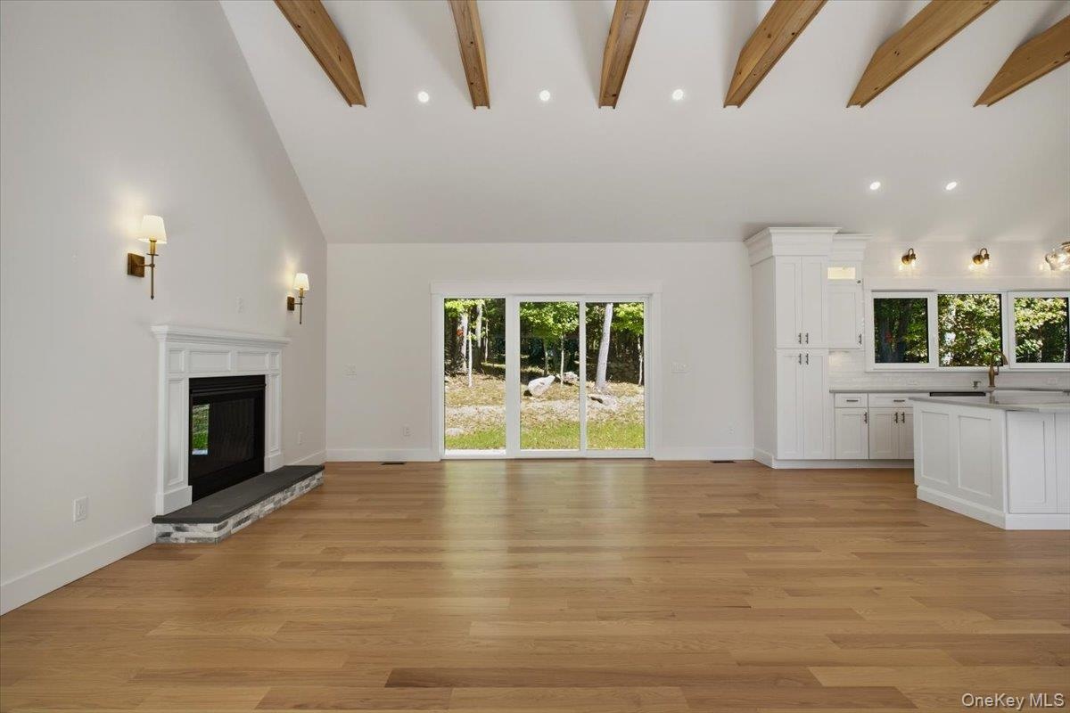 additional view of family room with sliding doors leading to outside