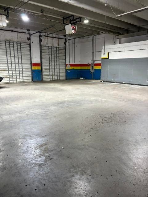 Corner warehouse parking in back and front