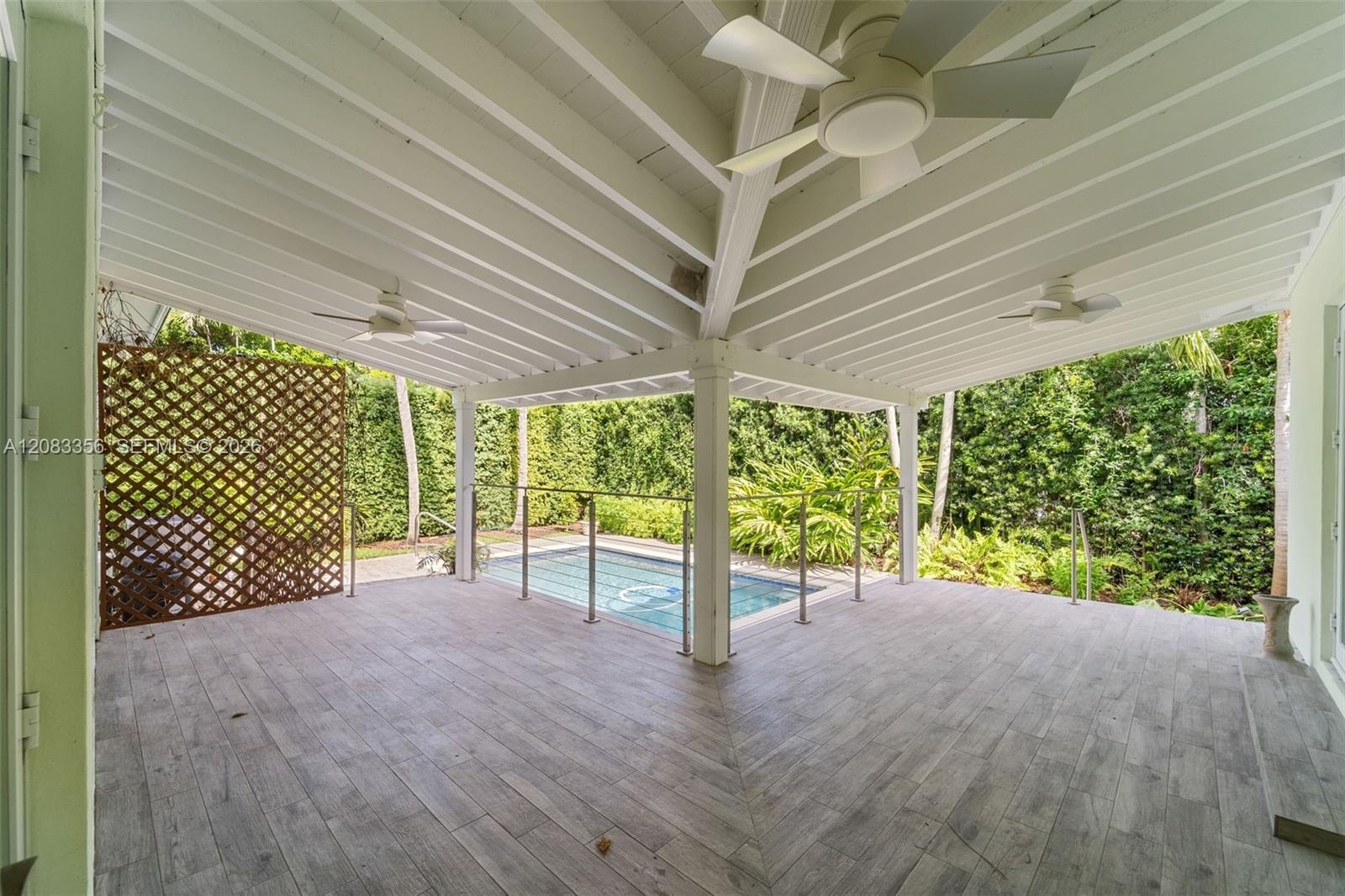 Generously-Sized Covered Patio Overlooking Pool