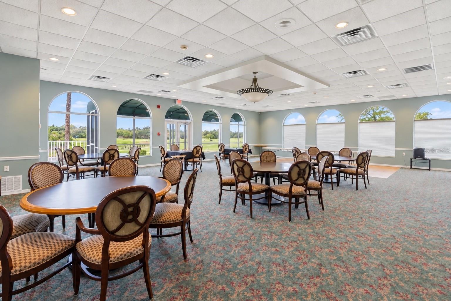 Clubhouse main dining room, digitally edited chandelier lighting