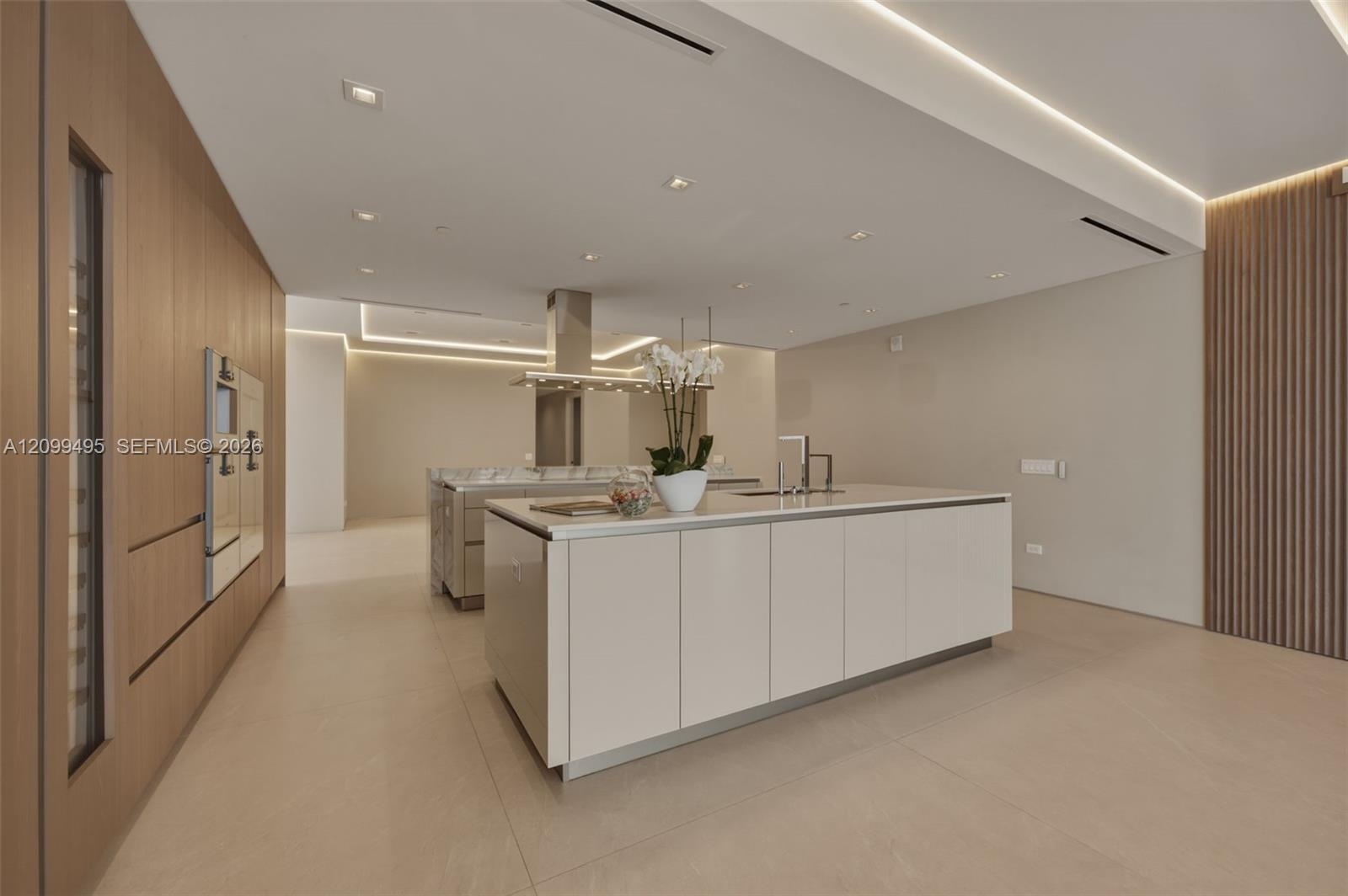 Snaidero® Italian custom cabinetry in kitchens along with imported Italian stone countertops.