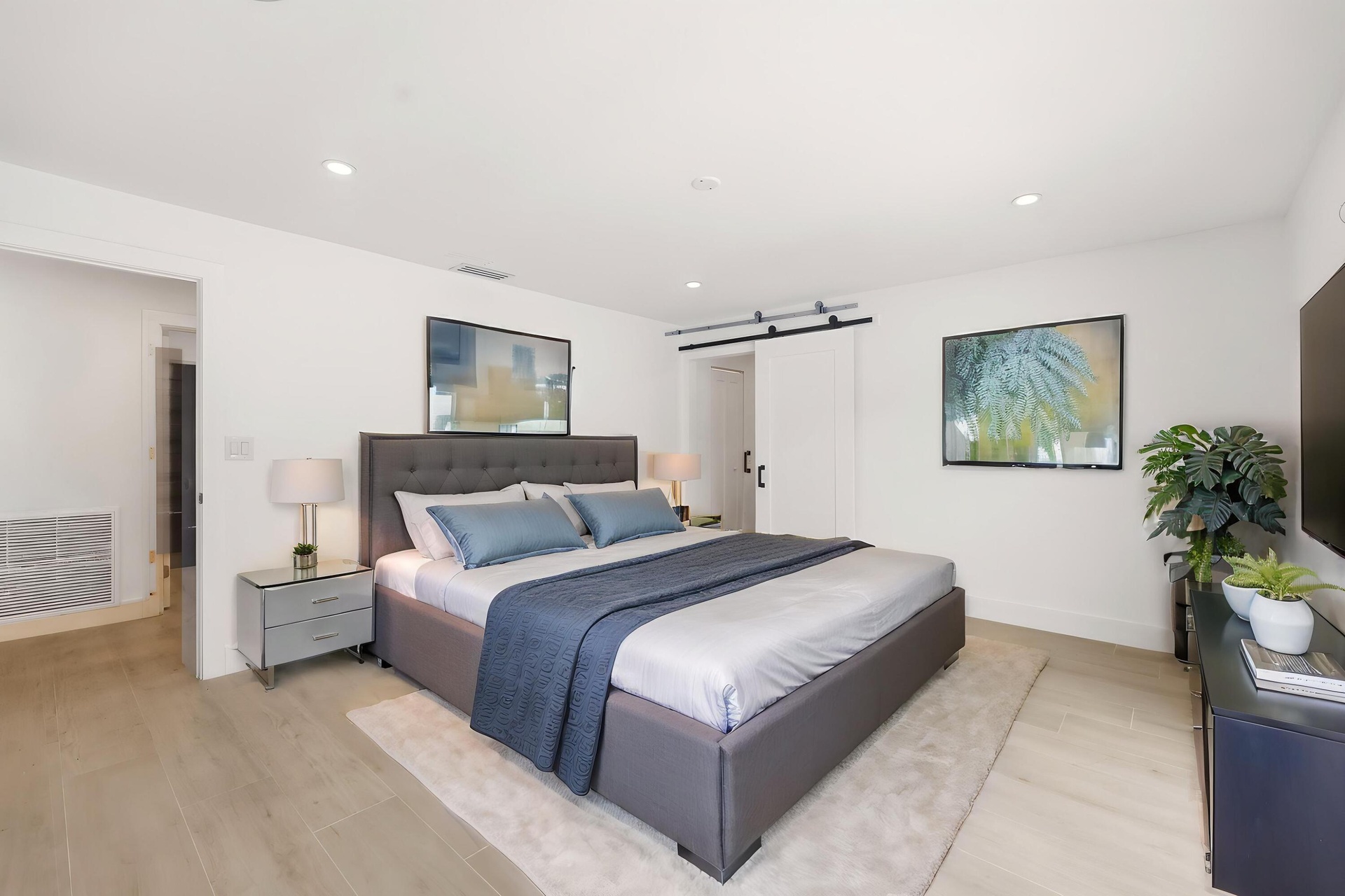 Designed as a true private guest retreat, this spacious suite offers exceptional comfort, privacy, and direct access to the backyard through oversized